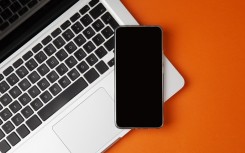 File: Laptop and smartphone. GettyImages/taylanibrahim