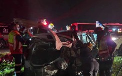 EMS workers at the scene of the accident. Supplied