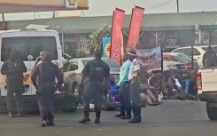 A group of taxi operators being detained by police in KwaDabeka following an e-hailing attack