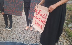 Community members attending the candlelight vigil in Eersterust. eNCA/Hloni Mtimkulu