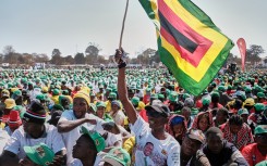 Supporters of Zimbabwe's ruling party Zanu-PF. AFP/Jekesai Njikizana