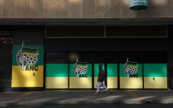 A man walks past Chief Albert Luthuli House, ANC headquarters in Johannesburg. AFP/Phill Magakoe
