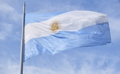 The Argentine flag flies on the flagpole at Plaza de Mayo, the main square in Buenos Aires. (Photo by Carolina Jaramillo/NurPhoto) (Photo by Carolina Jaramillo / NurPhoto / NurPhoto via AFP)