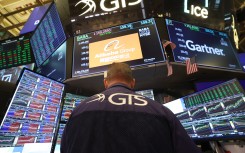 Traders work on the floor of the New York Stock Exchange (NYSE). AFP/Timothy A Clary