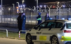 Danish police are seen at Copenhagen Airport. Steven Knap/Ritzau Scanpix/AFP