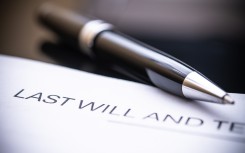 A close-up view of a last will and testament document. GettyImages/MoleQL