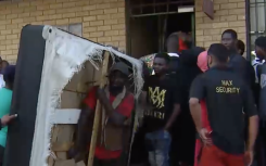 Security removing property from the building.