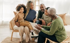 mixed family looking at documents