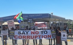 Human rights activists and the Organisation Undoing Tax Abuse have demonstrated outside the hospital. eNCA/Silindelo Masikane