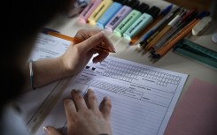 File: A pupil prepares to write an exam. AFP/Julien de Rosa