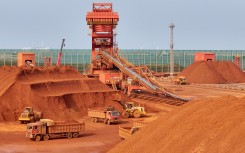 Concentrated bauxite and iron ore. Tang Ke/CFOTO via AFP