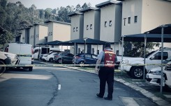 Police on the scene of the shooting in Waterfall. eNCA/Dasen Thathiah