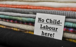 File: Sign advising customers that no child labour is used in the production. GettyImages/Stephen Barnes