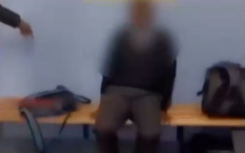 In the video, several boys can be seen beating a schoolmate with bats and other objects while celebrating the ordeal.