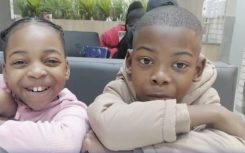 Eight-year-old Aphile and Aphelele Dlamini.