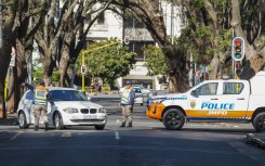 JMPD officers direct traffic on a road leading to the Nasrec Expo Centre. AFP/Zinyange Auntony
