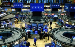 Traders work on the floor of the New York Stock Exchange (NYSE). AFP/Charly Triballeau