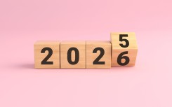 Wooden cubes showing the transition from year 2025 to 2026. GettyImages/Imagerouges