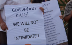 People attending the candlelight vigil.