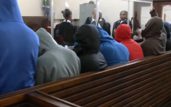 11 officers in the dock