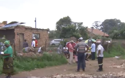 Family members at the collapsed building.