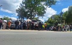 Parents queueing for school placements. eNCA/Hloni Mtimkulu