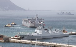 A general view of (L-R) the Chinese guided-missile destroyer Tangshan (Hull 122), the Iranian navy ship, the IRIS Makran 441, Chinese comprehensive supply ship Taihu (Hull 889) in the Simon's Town harbour, near Cape Town, on January 8, 2026.