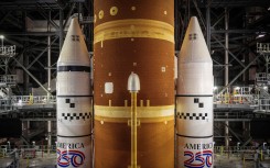 “America 250” is seen on the booster rockets for Artemis II. AFP/Jim Watson