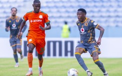Pule Mmodi of Kaizer Chiefs challenges Benedict Chepeshi of ZESCO United. BackpagePix/Chisanga Siame