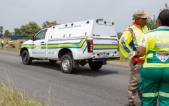 Emergency personnel and police at the scene where a scholar transport vehicle crashed. Gallo Images/Sharon Seretlo
