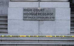 Police tape hangs in front of the Western Cape High Court. Michelly Rall/Getty Images