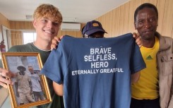 James Smith working with volunteers to resuscitate the patient.