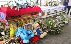 Families were overcome with grief at the funeral. eNCA/Manqoba Mchunu