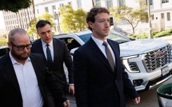 Meta CEO and Chairman Mark Zuckerberg (R) arrives at Los Angeles Superior Court. AFP/Patrick T Fallon 