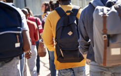 File: Students walking to campus. GettyImages/Klaus Vedfelt