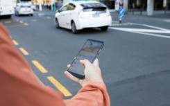 A person calling an e-hailing service