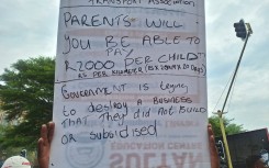 Scholar transport protest