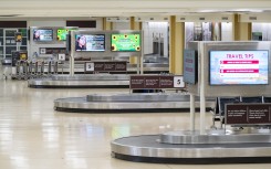 File: An empty baggage claim area at an airport. AFP/Saul Loeb