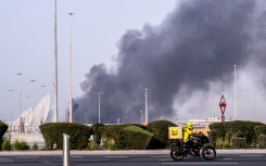A plume of smoke rising from the Zayed Port following a reported Iranian strike in Abu Dhabi. AFP/Ryan Lim