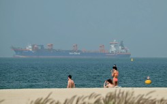 Cargo ships anchored off shore in Dubai. AFP/Giuseppe Cacace