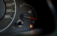 Empty fuel warning light in car dashboard. GettyImages/kckate16