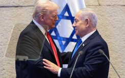  Donald Trump speaks with Israeli Prime Minister Benjamin Netanyahu. Evelyn Hockstein - Pool/Getty Images
