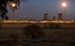 A Sasol coal-to-liquid fuel plant stands at dusk on July 7, 2008 in Secunda, South Africa