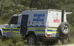 Police on the scene where the body was found. 