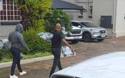 Properties connected to suspects in the murder of Emmanuel Mbense are being searched.