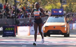 Kenyan Sharon Lokedi crosses the finish line to take second place in the New York Marathon in New York. AFP/Charly Triballeau