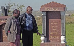 Family members of Griffiths Mxenge visit his, and his wife, Victoria's graves. Gallo Images/Oryx Media Archive