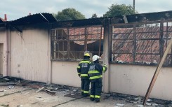 Firefighters at the scene of the Riverlea school fire. eNCA