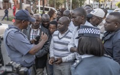 On Tuesday, refugees in Durban turned to police, seeking protection from groups like March and March. Photo by RAJESH JANTILAL / AFP