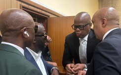 After spending the entire weekend behind bars, prominent taxi boss Joe “Ferrari” Sibanyoni and three co-accused walked free on Monday afternoon.